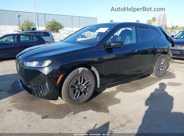 WB543CF09TCV01873 2026 BMW IX Black Vista tres cuartos delantera izquierda