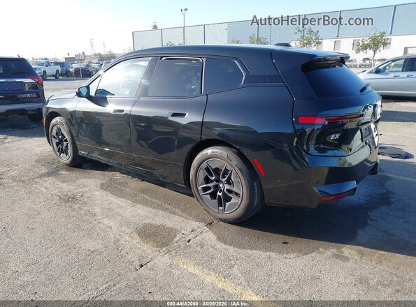 WB543CF09TCV01873 2026 BMW IX Black Trasero izquierdo