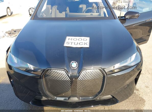 WB543CF09TCV01873 2026 BMW IX Black Vista trasera