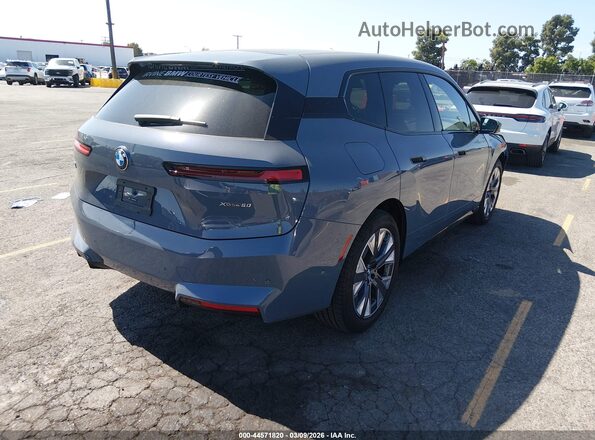 WB553CF08TCV17843 2026 BMW IX Gray Trasero derecho