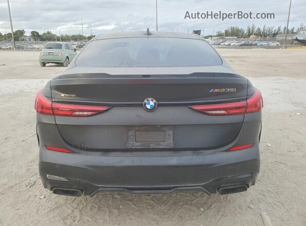 WBA13AL02L7F78822 2020 BMW M2 Black Հետևի տեսք