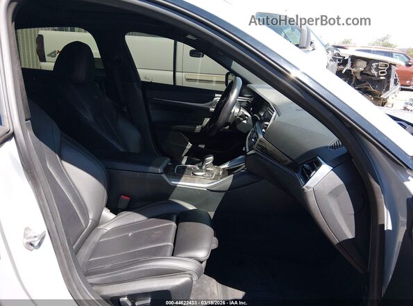 WBA13AW00NFM54517 2022 BMW OTHER Gray Vista interior delantera