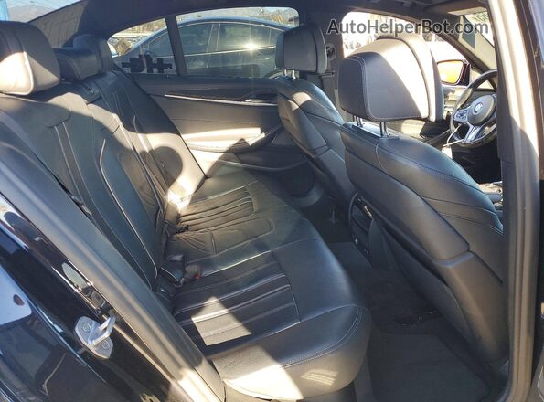 WBA13BK00MCF75241 2021 BMW M5 Blue Vista de los asientos traseros