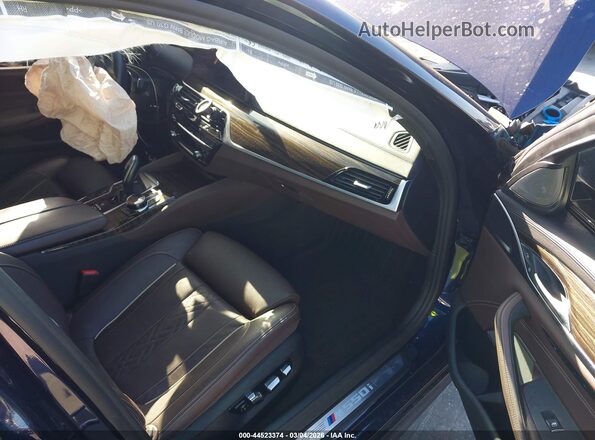 WBA13BK02MCF31919 2021 BMW 7 SERIES Blue Vista interior delantera