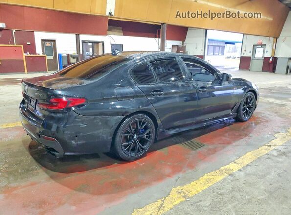 WBA13BK07MCG37704 2021 BMW M5 Black Trasero derecho