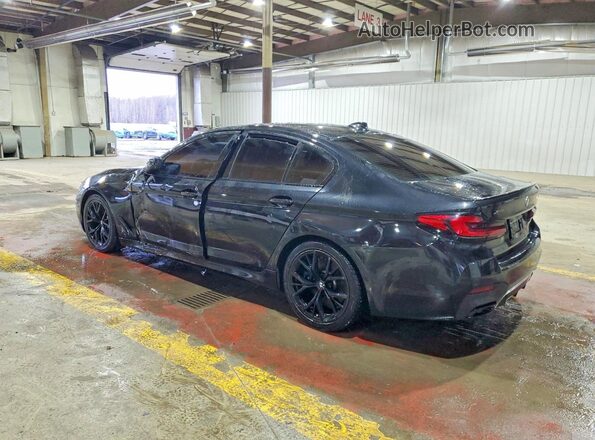 WBA13BK07MCG37704 2021 BMW M5 Black Trasero izquierdo
