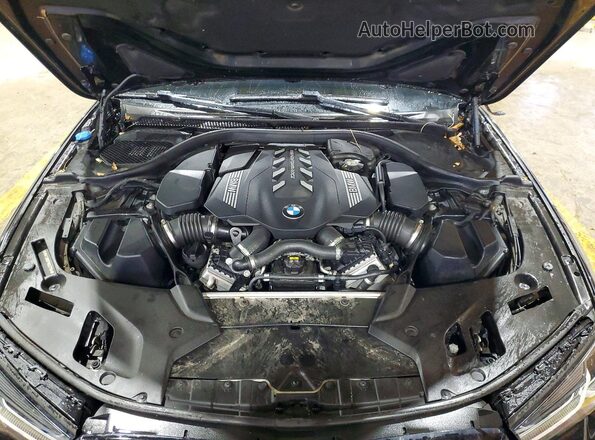 WBA13BK07MCG37704 2021 BMW M5 Black Vista interior trasera