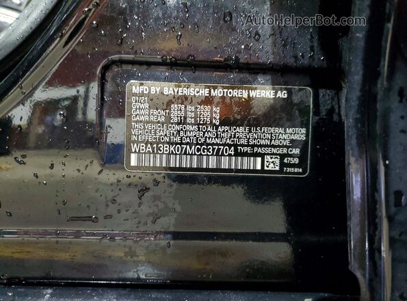 WBA13BK07MCG37704 2021 BMW M5 Black Vista del compartimento del motor