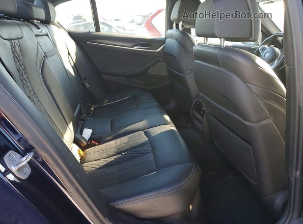 WBA13BK07NCK97744 2022 BMW M5 Blue Вид задніх сидінь