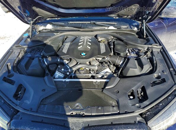 WBA13BK07NCK97744 2022 BMW M5 Blue Вид задньої частини салону