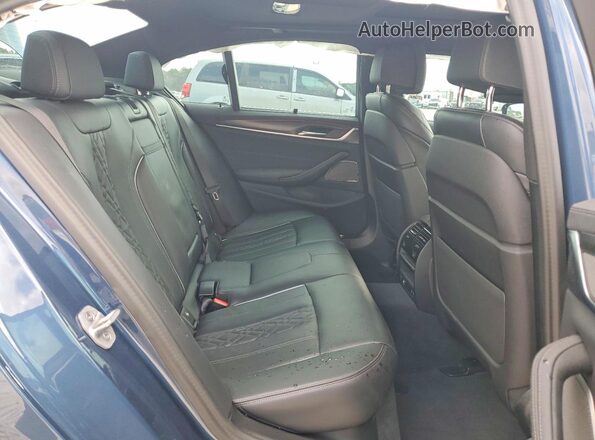 WBA13BK09PCM32189 2023 BMW M5 Blue Rear seats view