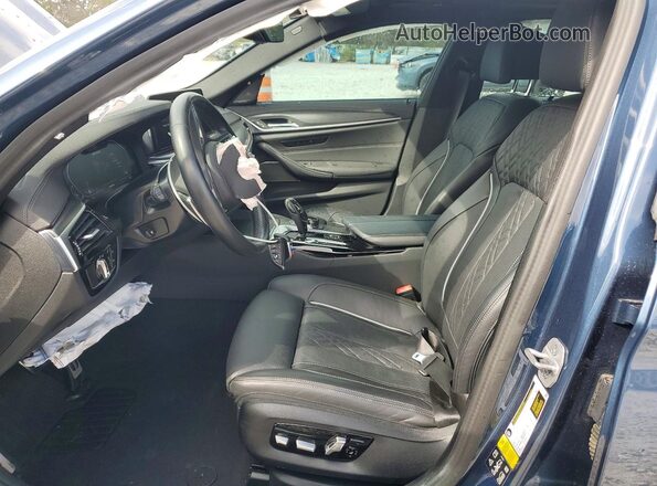 WBA13BK09PCM32189 2023 BMW M5 Blue Front interior view