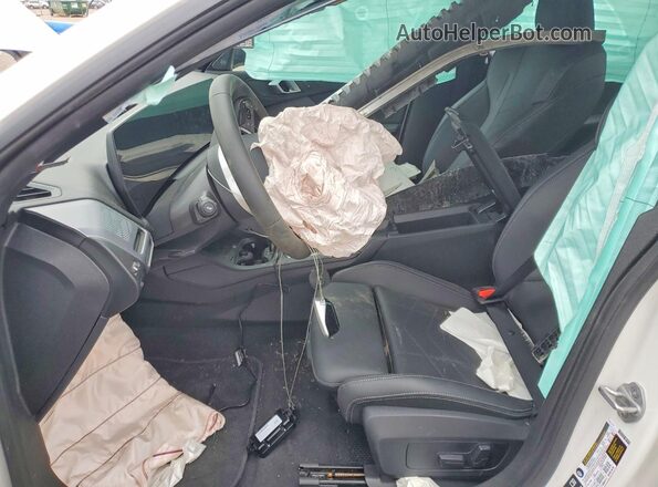 WBA23GG02T7U32239 2026 BMW 2 SERIES White Front interior view