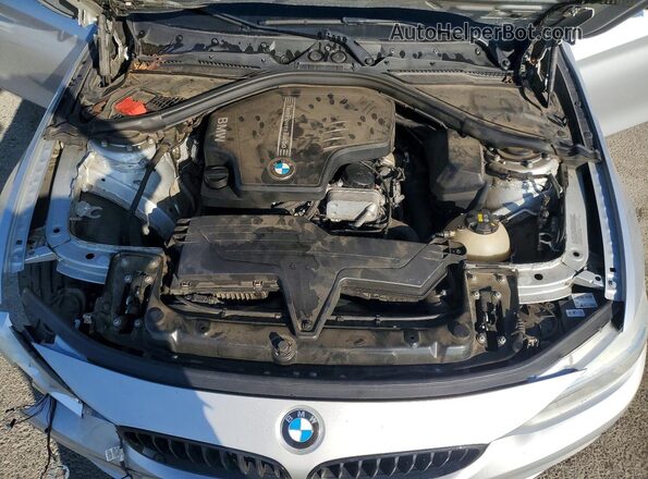 WBA4A9C54GGL89671 2016 BMW 4 SERIES Silver Rear interior view