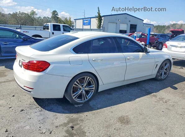 WBA4A9C5XGG507111 2016 BMW 4 SERIES White Rear right
