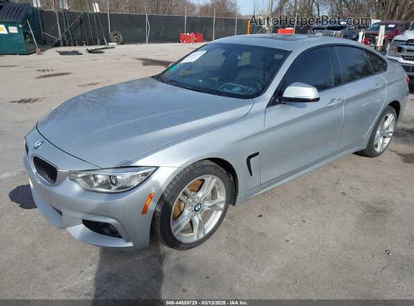 WBA4C9C55GG137275 2016 BMW 7 SERIES Silver Przód lewy