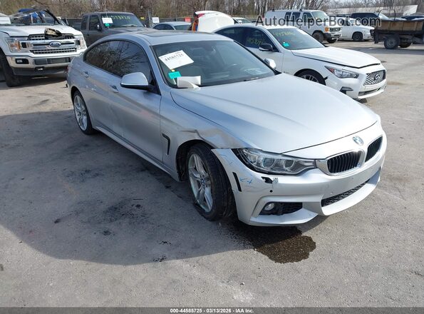 WBA4C9C55GG137275 2016 BMW 7 SERIES Silver Widok z przodu