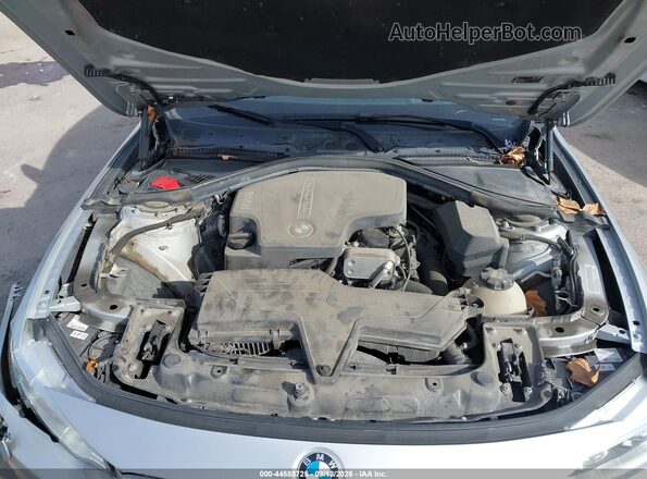 WBA4C9C55GG137275 2016 BMW 7 SERIES Silver Widok z tyłu