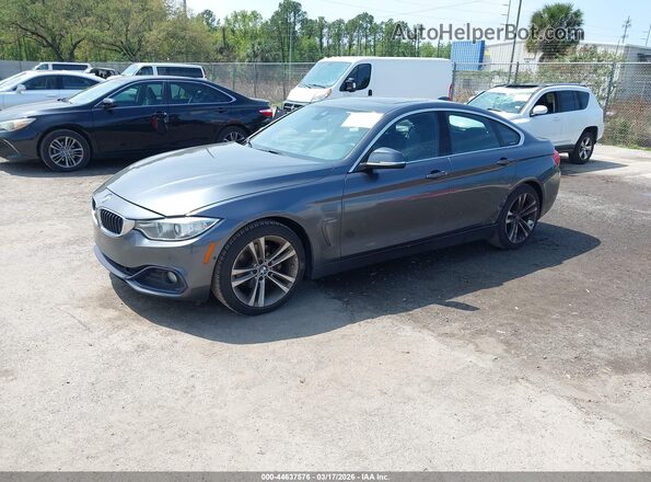 WBA4F7C52HG438163 2017 BMW 7 SERIES Gray Przód lewy