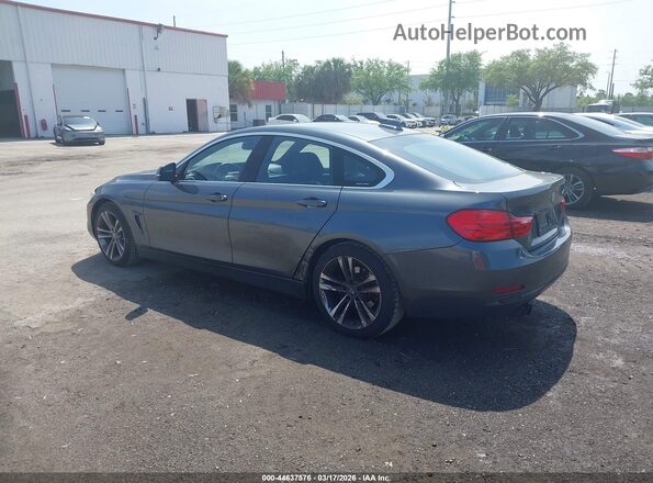 WBA4F7C52HG438163 2017 BMW 7 SERIES Gray Tył lewy