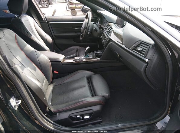 WBA4F7C52HG786271 2017 BMW 4 SERIES Black Front interior view