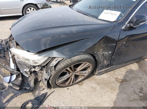 WBA4F7C52HG786271 2017 BMW 4 SERIES Black Front view
