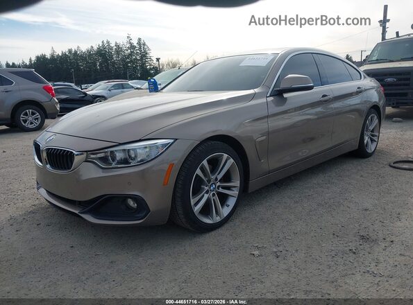 WBA4F7C58HG437616 2017 BMW 4 SERIES Желто-коричневый Передняя левая четверть
