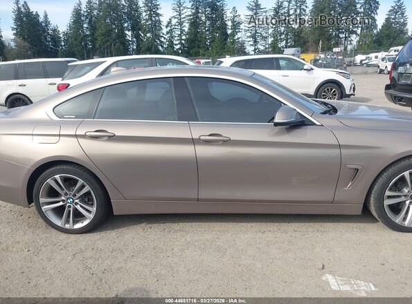 WBA4F7C58HG437616 2017 BMW 4 SERIES Желто-коричневый Вид задней части салона