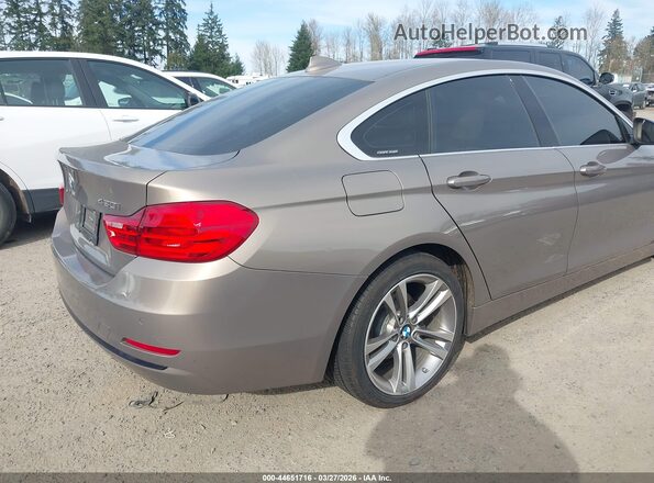 WBA4F7C58HG437616 2017 BMW 4 SERIES Желто-коричневый Вид спереди