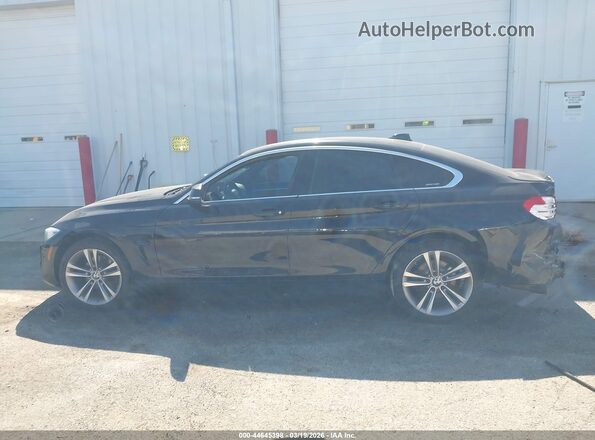 WBA4F9C50HG791822 2017 BMW 4 SERIES Black უკანა სალონის ხედი