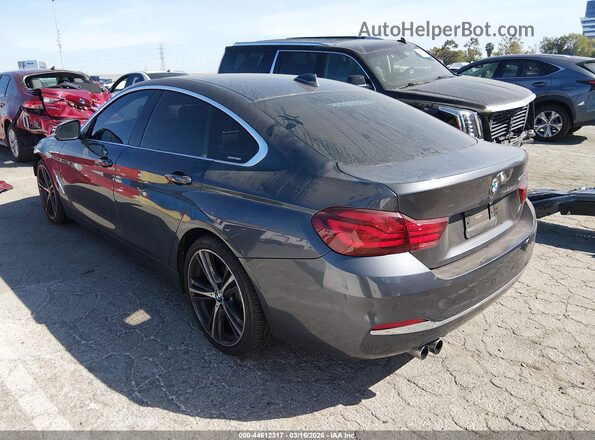 WBA4J1C04LBU67878 2020 BMW 4 SERIES Gray Trasero izquierdo