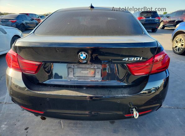 WBA4J1C05LBU68022 2020 BMW 4 SERIES Black უკანა ხედი