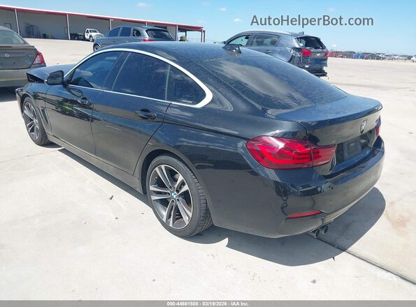 WBA4J1C06LBU68336 2020 BMW 7 SERIES Black Rear left