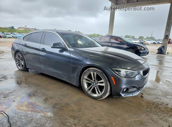 WBA4J1C57KBM12898 2019 BMW 4 SERIES Gray Widok z przodu