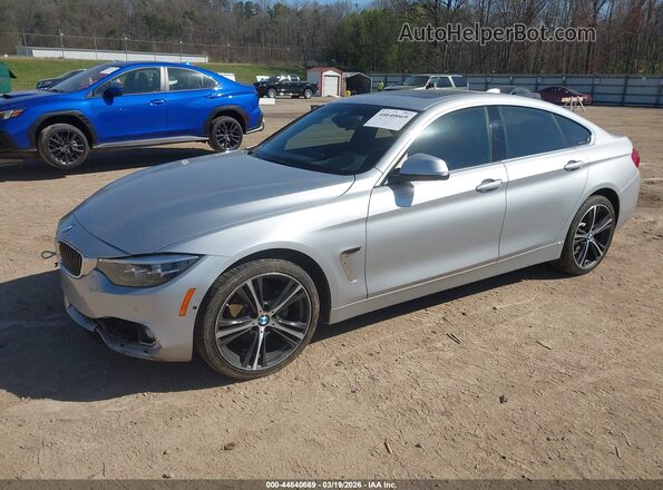 WBA4J3C50KBL06644 2019 BMW 4 SERIES Silver Vista tres cuartos delantera izquierda