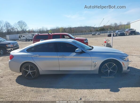 WBA4J3C50KBL06644 2019 BMW 4 SERIES Silver Vista interior trasera