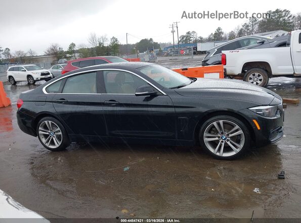 WBA4J3C57KBL08861 2019 BMW 4 SERIES Black უკანა სალონის ხედი