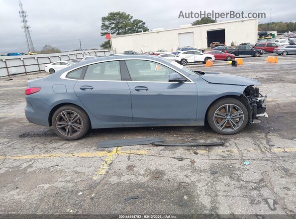 WBA53AK04P7M15692 2023 BMW 2 SERIES Light Blue ხელსაწყოთა პანელის ხედი