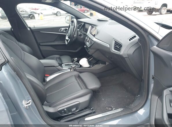 WBA53AK04P7M15692 2023 BMW 2 SERIES Light Blue წინა სალონის ხედი