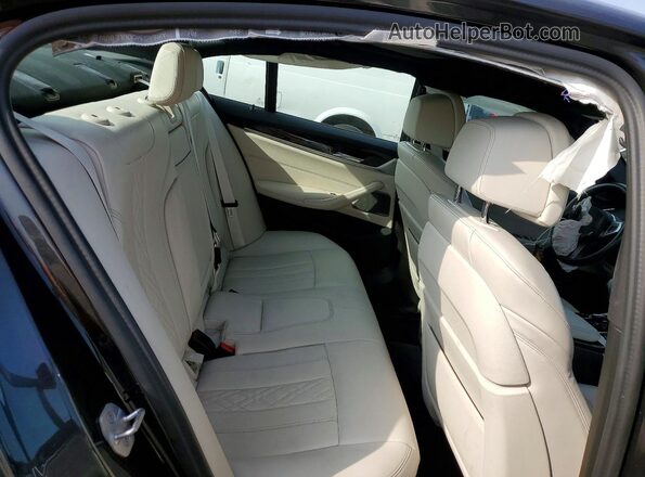 WBA53BH06PCM13656 2023 BMW 5 SERIES Black Rear seats view