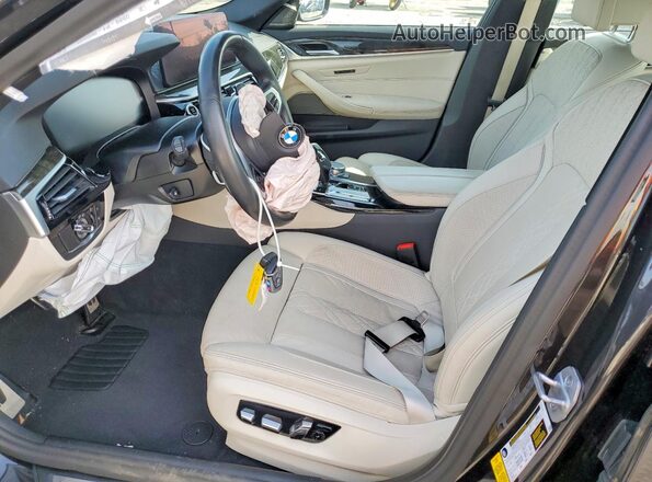 WBA53BH06PCM13656 2023 BMW 5 SERIES Black Front interior view
