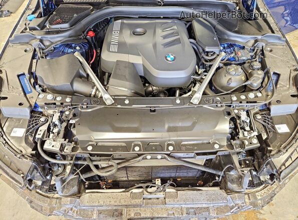 WBA53FJ00TCW74101 2026 BMW 5 SERIES Синий Вид задней части салона