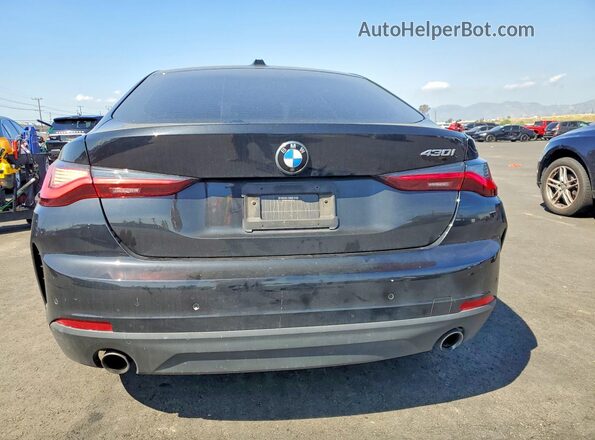 WBA63AV03NFM04105 2022 BMW 4 SERIES Black Rear view