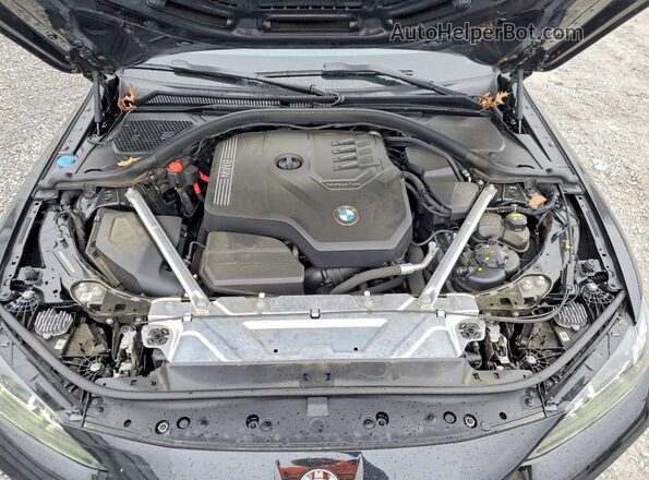 WBA63AV07NFM76490 2022 BMW 4 SERIES Black Vista interior trasera
