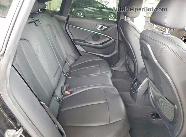 WBA73AK01L7F91203 2020 BMW 2 SERIES Black Rear seats view