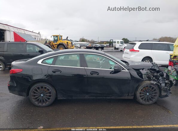WBA73AK06L7F89687 2020 BMW 2 SERIES Black Widok wnętrza z tyłu