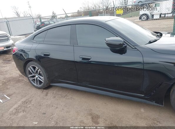 WBA73AV03PFN90591 2023 BMW 4 SERIES Черный Вид задней части салона