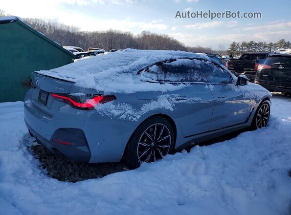 WBA73AV05PFP57565 2023 BMW 4 SERIES Gray Trasero derecho