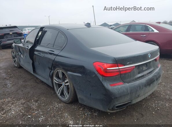 WBA7B0C59HG527003 2017 BMW 7 SERIES Gray Trasero izquierdo