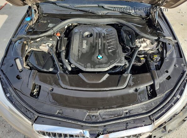 WBA7E2C55GG738717 2016 BMW 7 SERIES Tan Սալոնի հետևի տեսք